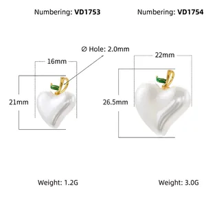 Elegant heart-shaped pearl charms with gold stems and green enamel leaves in two sizes