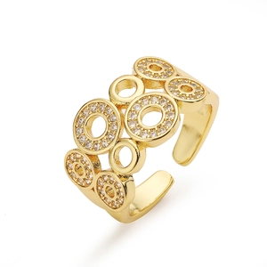 Close-up of geometric multi-layer 18K gold plated ring with sparkling zircon stones