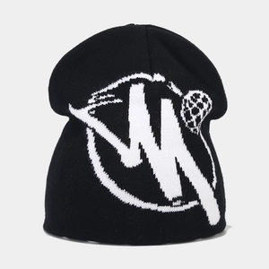 Close-up of black knitted beanie featuring white jacquard abstract graphic pattern