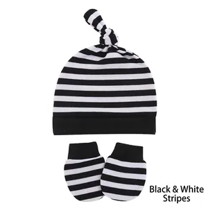 Black and white striped newborn knotted hat and matching scratch mittens set