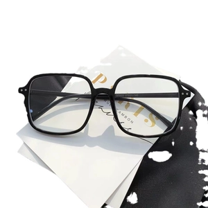 Classic glossy black full-frame anti-radiation glasses on white card and black pouch