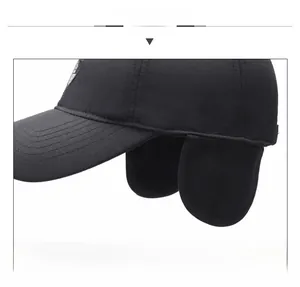 Detail view of winter baseball cap with ear flaps showing thermal thick material and stitching