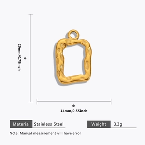 Detailed view of 20mm gold stainless steel geometric pendant with hammered texture details