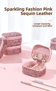 Pink sequin mini jewelry box interior with slots for rings and earrings