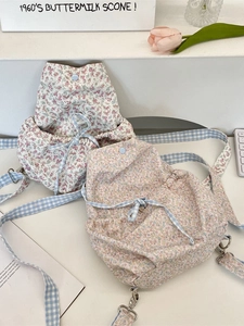 Chic floral canvas bucket backpack with blue checkered straps for a Korean style look