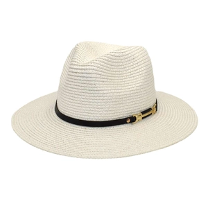 Detail of white Panama straw hat with black leather band and gold H-buckle hardware