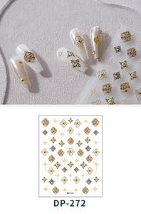 Detailed relief nail sticker DP-272 featuring gold 3D stars and clovers on pearl base