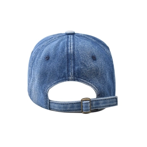 Detail of blue washed denim baseball cap featuring an adjustable metal buckle closure