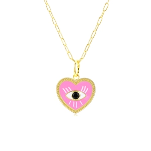 Detailed close-up of pink heart enamel pendant with evil eye design on gold necklace