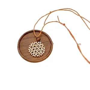 Handmade bohemian long heart woven necklace with wooden beads for summer beach vacations