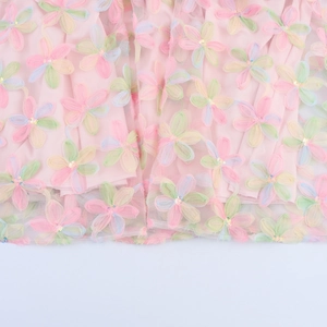 Pink mesh tulle dress with 3D colorful floral appliques and sequin details