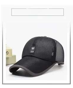 Detail of breathable black mesh baseball cap with embroidered logo and extended brim