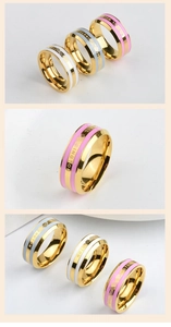 Detail of three-piece titanium steel rings with colorful enamel and engraved text