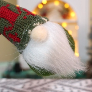 Hanging knitted Christmas gnomes with elk patterns and fluffy beards for festive tree decor