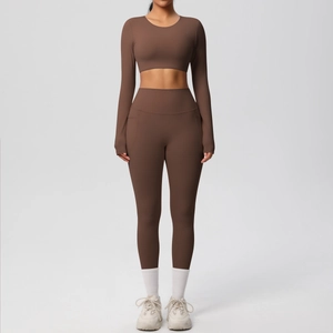 Coffee brown two-piece high-stretch yoga set with long sleeve crop top and high waist leggings