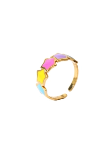 Detail of 18k gold plated adjustable ring with colorful enamel stars in macro view