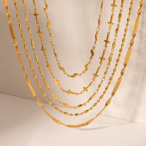 Classic gold-tone layered stainless steel necklace with star and cross pendants