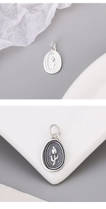 Macro detail of oval tulip pendants showing polished and vintage oxidized finishes