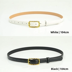Close-up of black and white PU leather belts with twisted gold square buckles