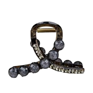 Elegant green marble beads hair claw with rhinestones on a minimalist white background