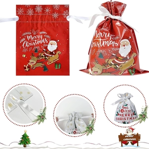 Christmas drawstring gift bags in red and white with festive reindeer patterns