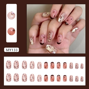 French blush pink leopard cat-eye press-on nails set with champagne glitter starbursts