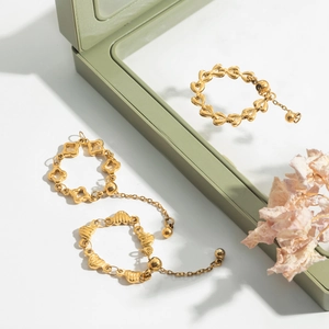 Elegant 18K gold-plated stainless steel heart chain rings with lucky clover charms