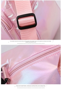 Pink pearlescent fitness bag showing adjustable strap buckle and smooth zipper detail