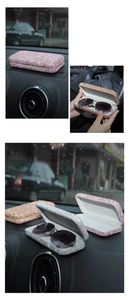 Detail showing crystal rhinestone car glasses boxes in pink, silver, and gold colors