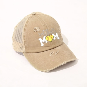 Detailed macro view of khaki softball mom hat with vintage distressed texture and mesh back