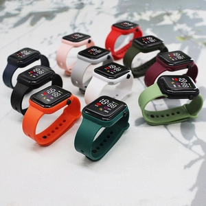 Detail showing various colorful silicone bands and square digital LED watch dials