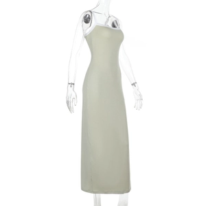 Detail view of backless knit maxi dress with thin straps and sleek green bodycon fit