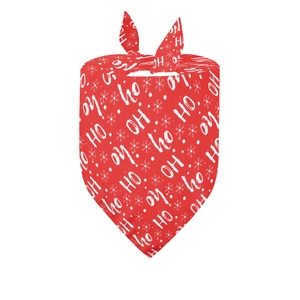 Detail of red Christmas pet bandana with HO HO HO text and snowflake pattern print