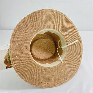 Brown straw sun hat with wide brim and silver sequins for summer beach vacations
