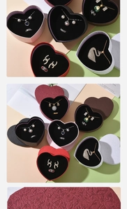 Macro overhead shot of assorted colorful heart-shaped jewelry boxes with sponge pads