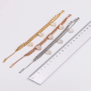 Three-color stainless steel heart link bracelets in gold, rose gold, and silver finishes