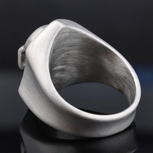 Punk vintage stainless steel skull ring with a brushed matte finish and dark silver tone