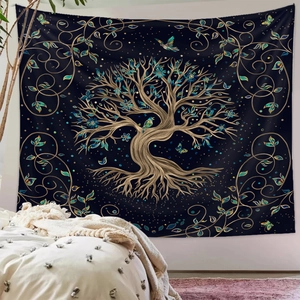 Close-up detail of tree of life tapestry with golden patterns on deep blue fabric