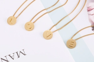 Chic gold plated stainless steel necklaces with engraved LOVE round letter pendants