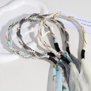 Elegant pearl and floral fabric headbands with long ribbons in four vintage styles