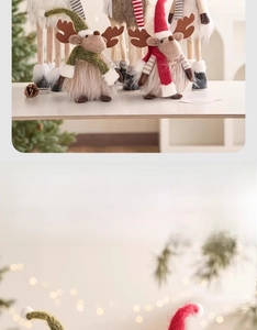 Detail of Christmas reindeer plush dolls with felt fabric and wooden legs for decor