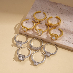 Five-piece set of gold and silver zircon open rings with square and round crystals