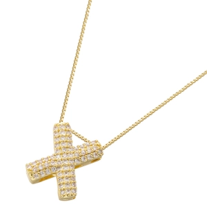 Detail of gold box chain necklace featuring a paved zircon letter X pendant