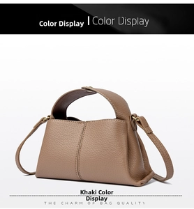 Detail of khaki square handbag showing pebble grain leather texture and gold hardware