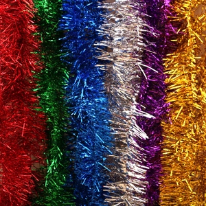 Festive multicolored Christmas tinsel garland set for tree and holiday party decorations