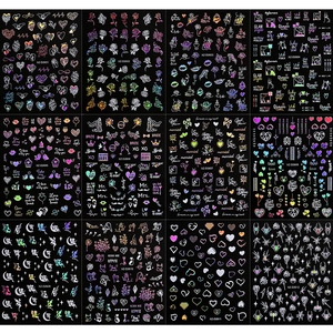 12 sheets of holographic heart and rose nail stickers on a professional black background