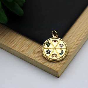 Detail of 18K gold plated charms with micro-inset colorful eye, heart, moon, and star patterns
