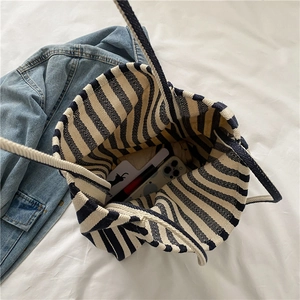 Blue and white striped canvas tote bag with spacious interior for daily casual essentials