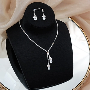 Elegant silver teardrop zircon necklace and earrings set for bridal wedding and gala