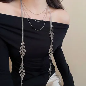 Elegant multi-layer silver leaf tassel necklace with minimalist bohemian fringe pendant